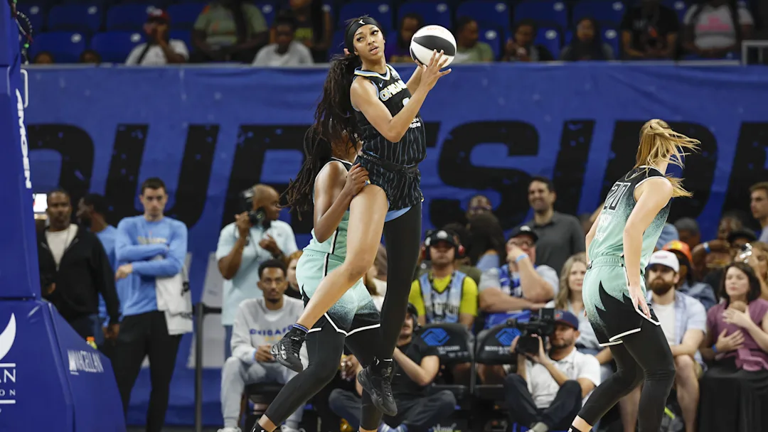 Angel Reese action shot